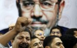 Hija de Mursi dice que un doble suplanta a su padre en juicios