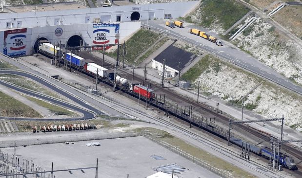 An Eurotunnel freight shuttle enters the Channel tunnel in Coquelles, near Calais, northern France, July 21, 2015. Protesting ferry workers temporarily blocked French road access to the undersea rail tunnel linking France to Britain on Tuesday, a Eurotunnel spokesman said. Employees of the Eurotunnel-owned MyFerryLink service - whose ferries the company plans to sell - brought traffic in the tunnel to a standstill for a whole day last month, also disrupting seabound travel from the port of Calais, in protest at the sale.   REUTERS/Pascal Rossignol