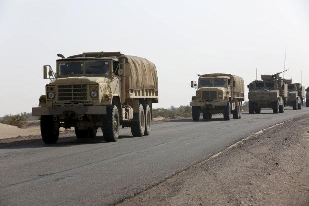 Military vehicles carrying Gulf Arab soldiers arrive at Yemen's northern province of Marib September 8, 2015. A Saudi-led alliance has deployed 10,000 troops to Yemen, Qatari news channel Al Jazeera said on Tuesday, in an apparent sign of determination to rout Iran-allied Houthi forces after they killed at least 60 Gulf Arab soldiers on Friday. REUTERS/Stringer