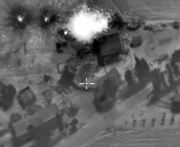 A video grab made on October 1, 2015, shows an image taken footage made available on the Russian Defence Ministry's official website, purporting to show an airstrike in Syria. President Vladimir Putin on October 1 dismissed claims that Russian air strikes had killed civilians in Syria as 