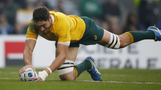 Un try es el máximo logro en un partido de rugby. En esta oportunidad Australia anota uno. (Reuters)