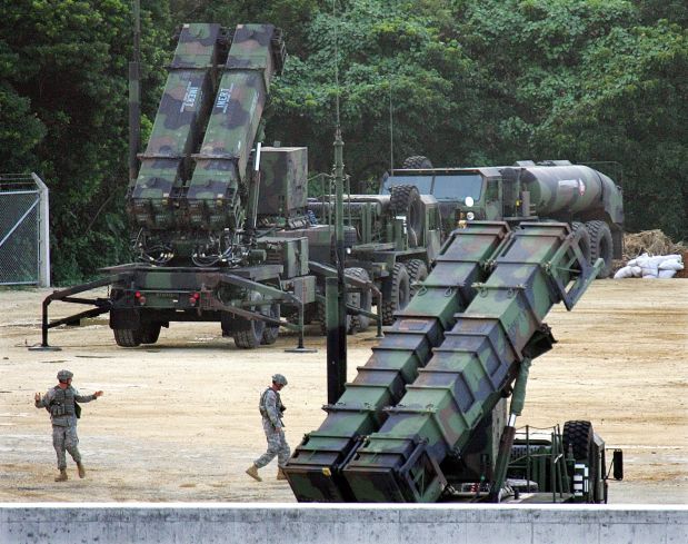Patriot missiles PAC-3 launchers are seen at the  Kadena U.S. Air Base in Okinawa, southern Japan, Friday, Feb. 9, 2007. The deployment is part of a multibillion dollar effort to build a ballistic missile shield in the Pacific to counter the threat of an attack by North Korea, which shocked the region last July with a series of missile tests and then again in October with the announcement of its first nuclear test. (AP Photo/Itsuo Inouye)