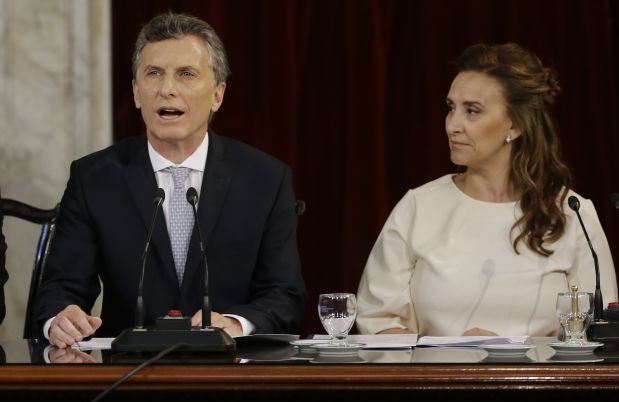 Mauricio Macri, left, delivers his inauguration speech after being sworn-in, as new president by Vice-President and Senate President Gabriela Michetti, right, looks on, at Congress in Buenos Aires, Argentina, Thursday, Dec. 10, 2015. Macri was sworn in, inheriting myriad economic problems from the often divisive outgoing President Cristina Fernandez, who skipped the inauguration in a final sign of defiance that underscored deep polarization in the South American nation. (AP Photo/Ricardo Mazalan)