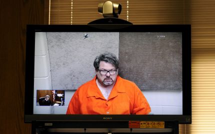 Jason Dalton is seen on closed circuit television during his arraignment in Kalamazoo County, Michigan, February 22, 2016. Dalton, suspected of killing six people and wounding two others in apparently random shootings, was an Uber driver who a TV station reported may have given rides to customers of the car-hailing services during the rampage.  REUTERS/Mark Kauzlarich      TPX IMAGES OF THE DAY
