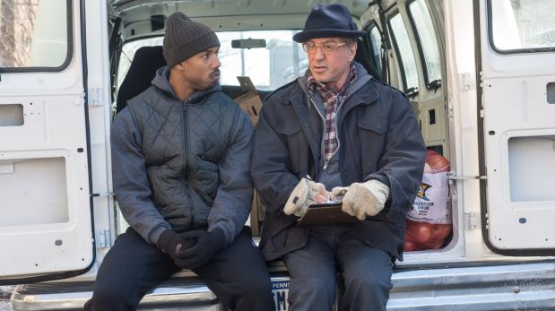 This photo provided by Warner Bros. Pictures shows Michael B. Jordan, left, and Sylvester Stallone in a scene from 