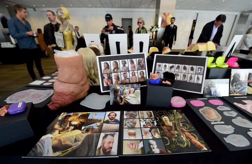 Samples of the work of Makeup and Hairstyling artists from Oscar-nominated films '100 Year Old Man Climbed Out the Window and Disappeared', 'The Revenant' and 'Mad Max: Fury Road'  are displayed at a reception featuring the 2015 Oscar-nominated films in the makeup and Hairstyling Category on February 27, 2016 in Beverly Hills, California, one day before the 88th Academy Awards takes place in Hollywood. / AFP / FREDERIC J. BROWN