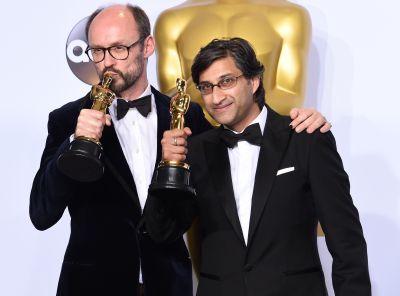 Asif Kapadia (R) and James Gay-Rees pose with their Oscar for Best Documentary Feature, 