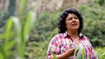 In this Jan. 27, 2015 photo released by The Goldman Environmental Prize, Berta Caceres speaks to people near the Gualcarque river located in the Intibuca department of Honduras. Caceres, the Council of Popular and Indigenous Organizations of Honduras (COPINH) and residents of the region maintained a two year struggle to halt construction on the Agua Zarca Hydroelectric project. On March 3, 2016, a member of her indigenous council group said at least two assailants broke into her home and shot Caceres to death. She won the 2015 Goldman Environmental Prize for her role in fighting the dam project. (Tim Russo/Goldman Environmental Prize via AP)