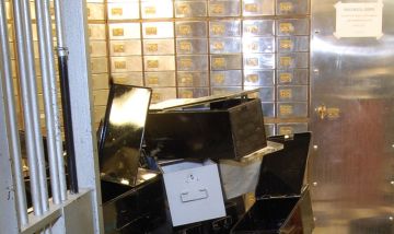 An undated photo made available by the Metropolitan Police of the inside of the vault at the Hatton Garden Safe Deposit company. Three men were convicted, Thursday, Jan. 14, 2016, of involvement in raiding London's famed Hatton Garden jewelry district, an audacious heist that prosecutors called the largest burglary in English history. The haul, which included gold and diamond jewelry, cash and other valuables belonging to local jewelers, was worth an estimated 14 million pounds ( million). (Metropolitan Police Photo via AP)