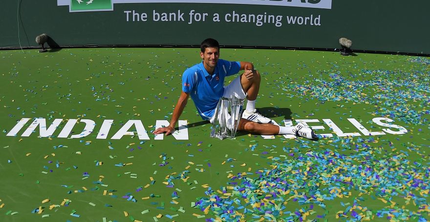 Novak Djokovic, of Serbia, poses on the court after defeating Milos Raonic, of Canada, in a final at the BNP Paribas Open tennis tournament, Sunday, March 20, 2016, in Indian Wells, Calif. Djokovic won 6-2, 6-0. AP Photo/Mark J. Terrill)