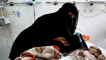 In this Tuesday, March 22, 2016 photo, Udai Faisal, who is suffering acute malnutrition is fed by his mother Intissar Hezzam at Al-Sabeen Hospital in Sanaa, Yemen. Hunger has been the most horrific consequence of Yemen?s conflict and has spiraled since Saudi Arabia and its allies, backed by the U.S., launched a campaign of airstrikes and a naval blockade a year ago. The impoverished nation of 26 million people, which imports 90 percent of its food, already had one of the highest malnutrition rates in the world, but in the past year the statistics have leaped. (AP Photo/Maad al-Zikry)