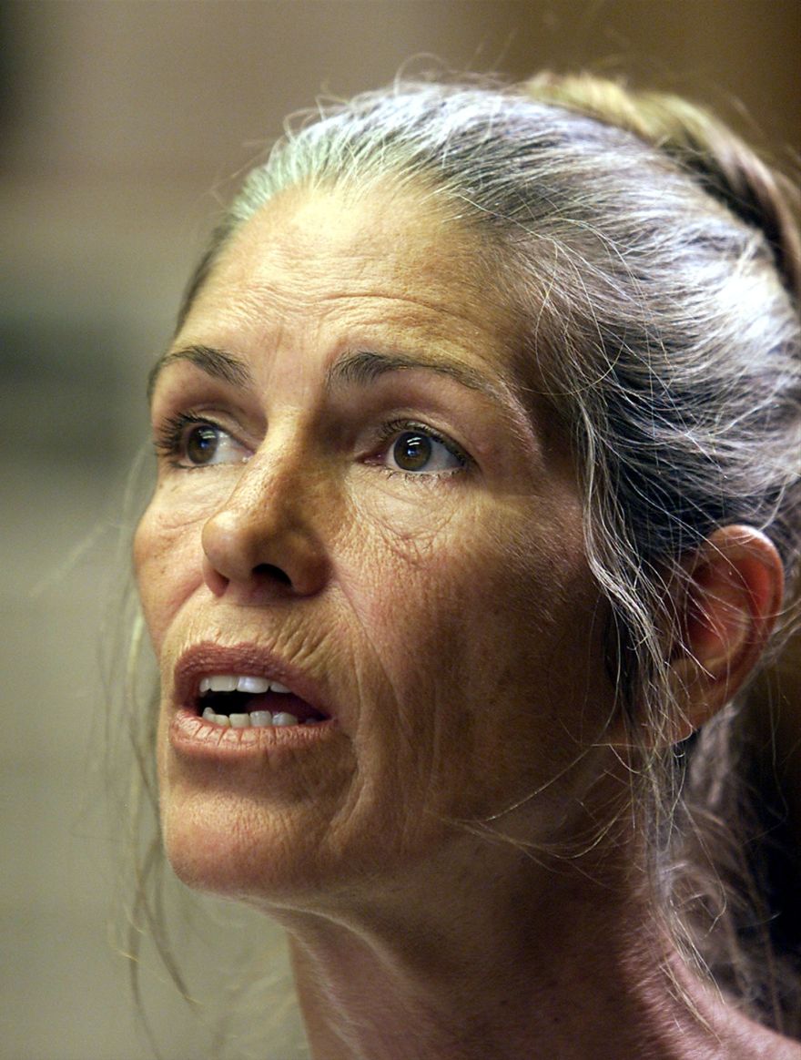 FILE PHOTO - Leslie Van Houten listens during her parole hearing in Corona, California, June 28, 2002. Los Angeles' top prosecutor on June 28, 2016, urged California Governor Jerry Brown to keep former Charles Manson follower Van Houten behind bars, despite the recommendation of a parole board that she be released. REUTERS/DamianDovarganes/POOL