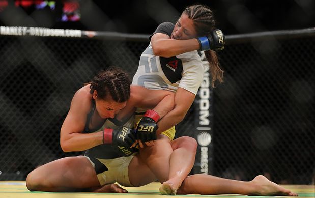 LAS VEGAS, NV - JULY 9: Julianna Pena punches Cat Zingano during the UFC 200 event at T-Mobile Arena on July 9, 2016 in Las Vegas, Nevada. (Photo by Rey Del Rio/Getty Images)