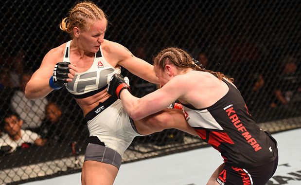 ORLANDO, FL - DECEMBER 19:   (L-R) Valentina Shevchenko kicks Sarah Kaufman in their women's bantamweight bout during the UFC Fight Night event at the Amway Center on December 19, 2015 in Orlando, Florida. (Photo by Josh Hedges/Zuffa LLC/Zuffa LLC via Getty Images)