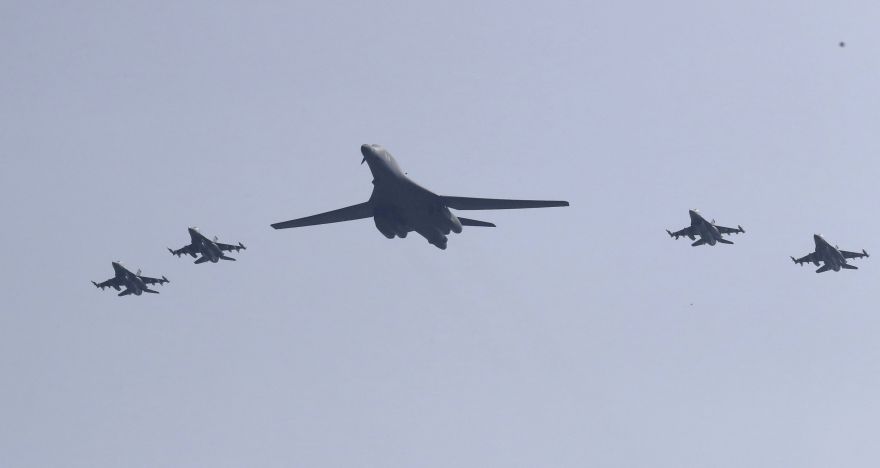 U.S. B-1 bomber, center, flies over Osan Air Base with U.S. jets in Pyeongtaek, South Korea, Tuesday, Sept. 13, 2016. The United States on Tuesday sent nuclear-capable supersonic bombers streaking over ally South Korea in a show of force meant to cow North Korea after its recent nuclear test and also to settle rattled nerves in the South. (AP Photo/Lee Jin-man)