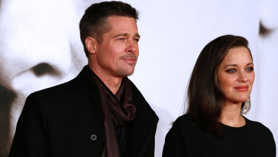 Brad Pitt se luce con Marion Cotillard en la alfombra roja