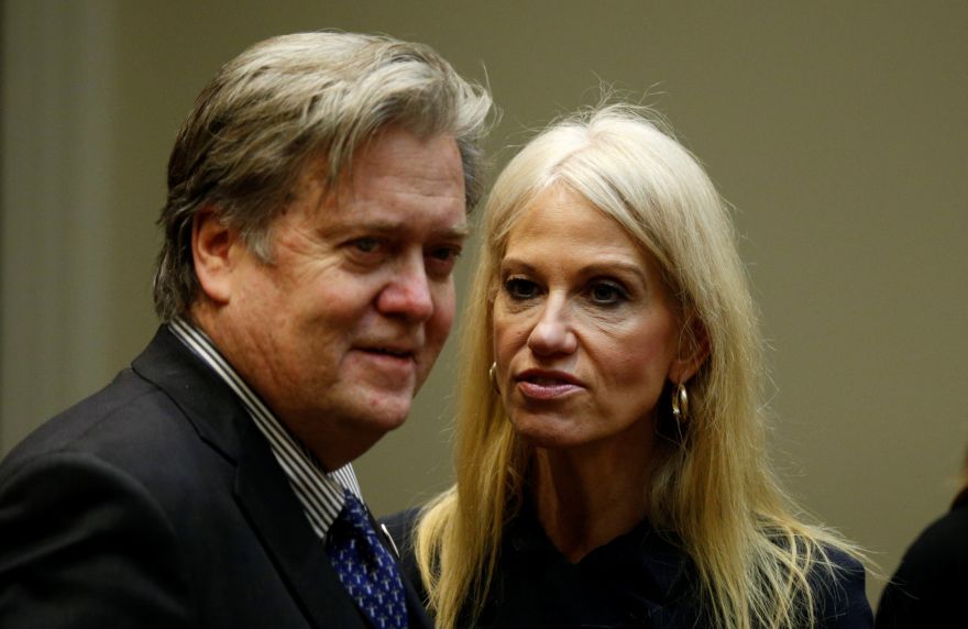 U.S. President Donald Trump's chief strategist Steve Bannon (L) and senior aide Kellyanne Conway speak at meeting hosted by Trump with cyber security experts in the Roosevelt Room of the White House in Washington, U.S., January 31, 2017. REUTERS/Kevin Lamarque