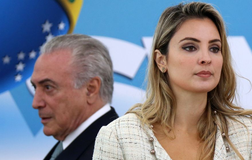 Brazil's President Michel Temer and his wife Marcela attend a ceremony at Planalto Palace in Brasilia, Brazil December 7, 2016. REUTERS/Adriano Machado