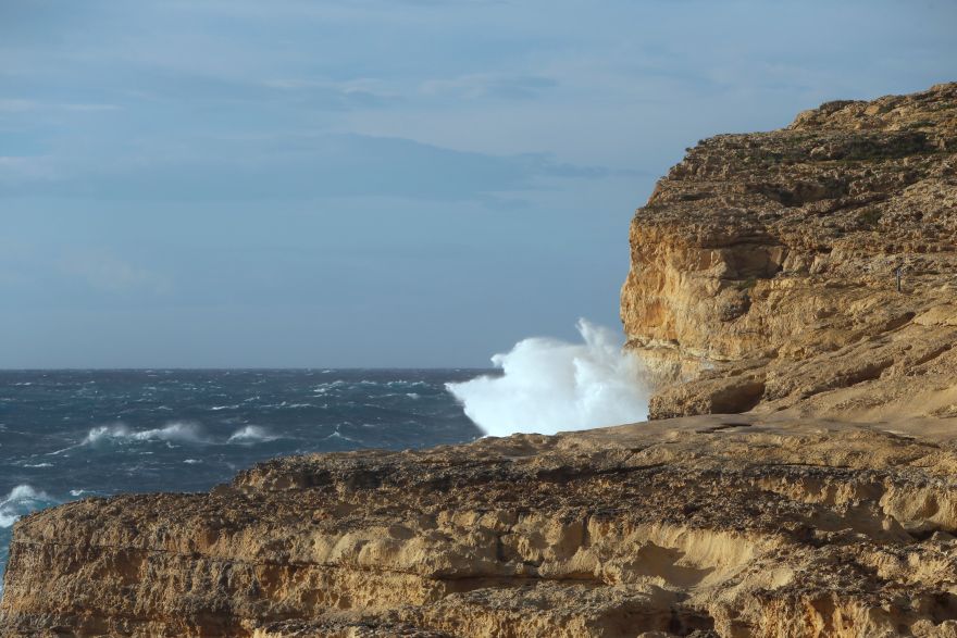 Waves break against the cliffs where the structure known as the Azure Window, because it arched over blue seas popular with divers, collapsed as the Maltese islands were hit by rough seas and stormy weather, at Dwejra on the island of Gozo, Malta, March 8, 2017.   REUTERS/Darrin Zammit Lupi