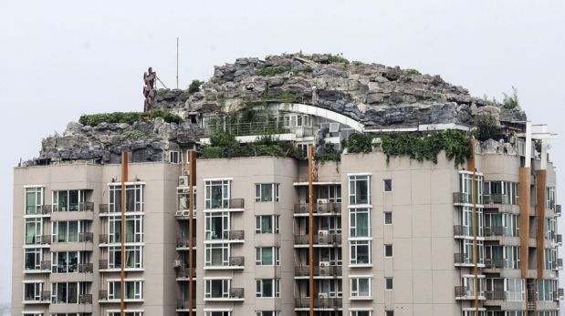 FOTOS: un cerro y una mansión sobre un rascacielos en China podrían ser derribados