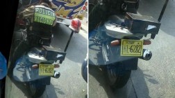 Con placa de cartón: así se moviliza un policía motorizado