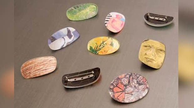 Mira estos broches creados con lunas de lentes reciclados