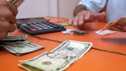 El dólar trepó a S/.3,10 y la BVL opera con índices negativos