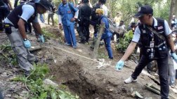 Malasia halla 139 fosas y 28 campos de detención de migrantes